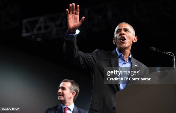 Former US President Barack Obama speaks during a campaign rally for Democratic Gubernatorial Candidate Ralph Northam in Richmond, Virginia October...