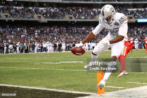 Amari Cooper of the Oakland Raiders scores a 38-yard touchdown against the Kansas City Chiefs during their NFL game at Oakland-Alameda County...
