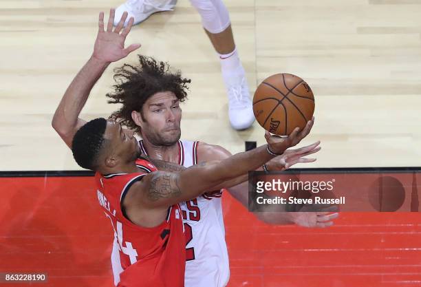 Toronto Raptors guard Norman Powell gets past Chicago Bulls center Robin Lopez as the Toronto Raptors open their season against the Chicago Bulls at...