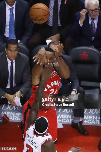 Toronto Raptors guard Norman Powell throws up a three pointer over \v3\ as the Toronto Raptors open their season against the Chicago Bulls at the Air...