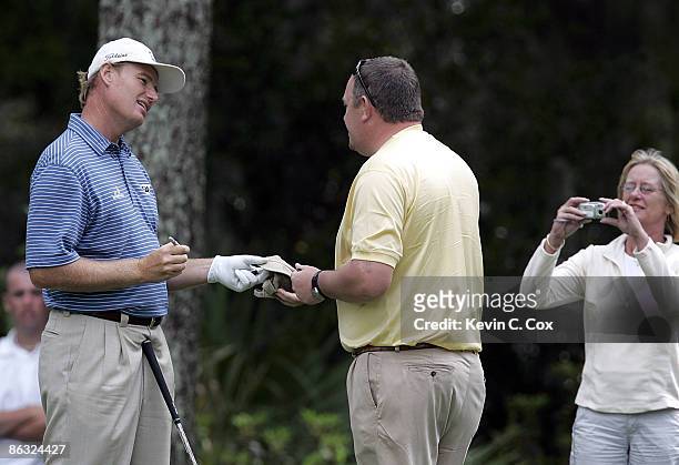 Ernie Els signs an autograph during the Verizon Heritage Pro-Am Wednesday, April 12 at Harbour Town Golf Links in Hilton Head Island, South Carolina.