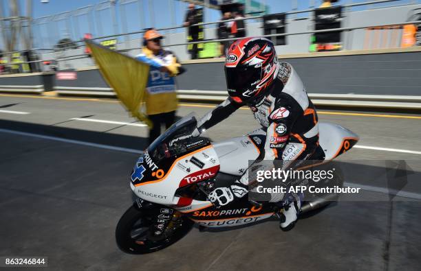 Peugeot MC Saxoprint rider Patrick Pulkkinen of Finland enters the pit lane during the Moto3-class first practice session of the Australian MotoGP...