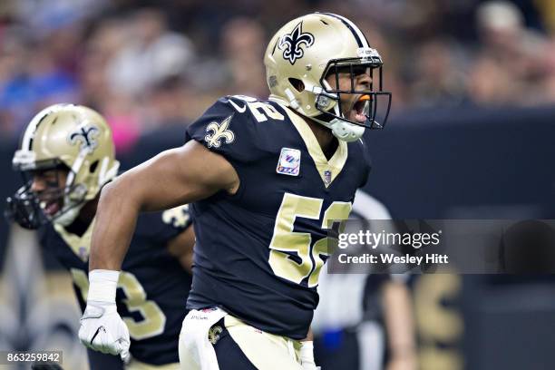 Craig Robertson of the New Orleans Saints celebrates after a big play during a game against the Detroit Lions at Mercedes-Benz Superdome on October...
