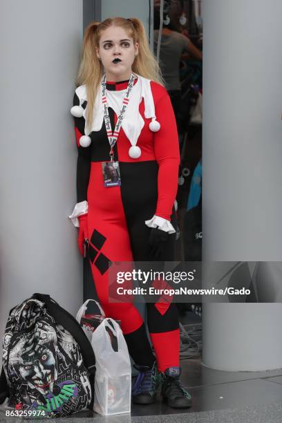 Full length portrait of a female comic book fan in costume during New York Comic Con at the Jacob Javits Convention Center in New York City, New...