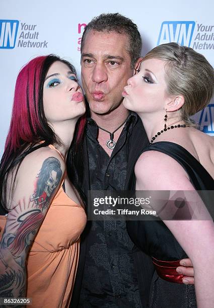 Adult film actress Joanna Angel, Director/Photographer Michael Grecco and adult film actress Sunny Lane pose at the Los Angeles premiere of "Naked...