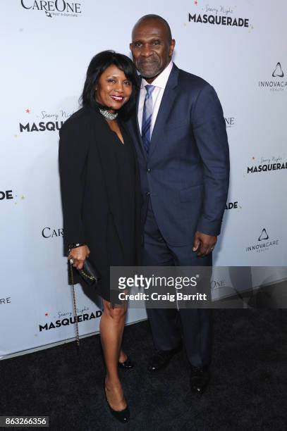 Player Harry Carson and Maribel Carson attend Daniel E Straus & CareOne Starry Night Masquerade For Puerto Ricoat Skylight Clarkson North on October...