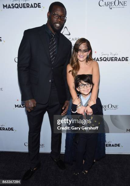 Player Jason Pierre- Paul, CareOne Executive Vice President Lizzy Straus and Jack Straus attend the 2017 CareOne Masquerade Ball for Puerto Rico...