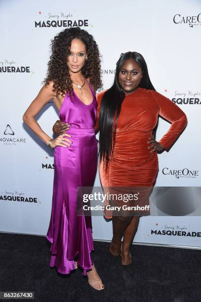 Actors Joan Smalls and Danielle Brooks attend the 2017 CareOne Masquerade Ball for Puerto Rico Relief Effort at Skylight Clarkson North on October...