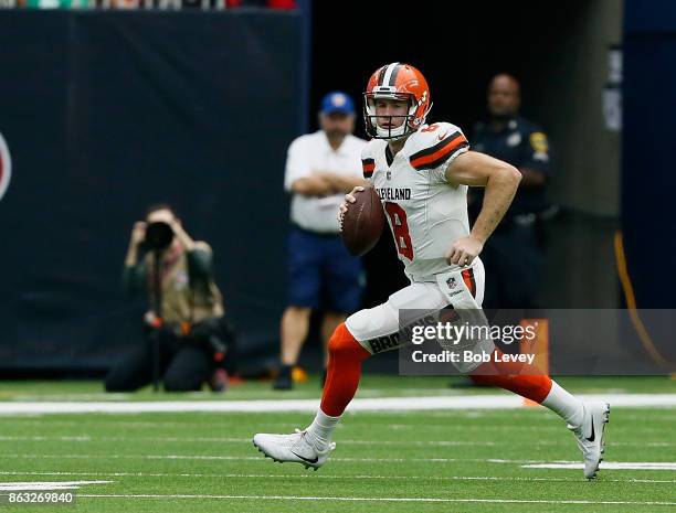 Kevin Hogan of the Cleveland Browns runs out of the pocket against the Houston Texans at NRG Stadium on October 15, 2017 in Houston, Texas.