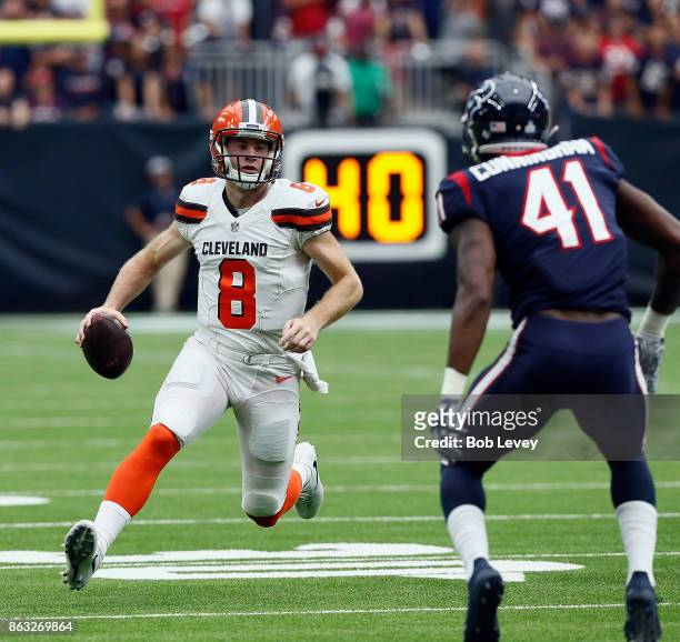 Kevin Hogan of the Cleveland Browns runs out of the pocket against the Houston Texans at NRG Stadium on October 15, 2017 in Houston, Texas.