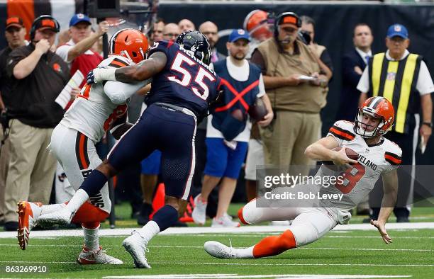 Kevin Hogan of the Cleveland Browns slides after a run as Benardrick McKinney of the Houston Texans moved in for a tackleat NRG Stadium on October...