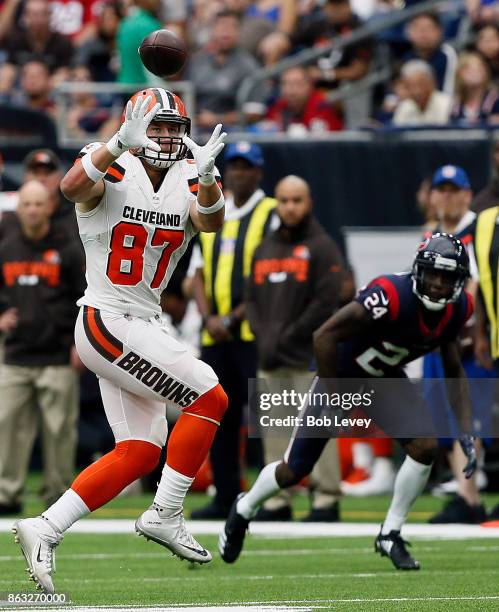 Seth DeValve of the Cleveland Browns catches a pass in front of Johnathan Joseph of the Houston Texans at NRG Stadium on October 15, 2017 in Houston,...