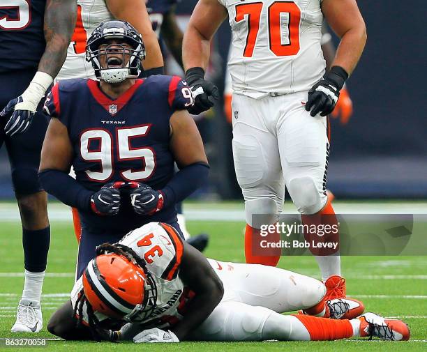 Christian Covington of the Houston Texans reacts after a tackle on Isaiah Crowell of the Cleveland Browns at NRG Stadium on October 15, 2017 in...