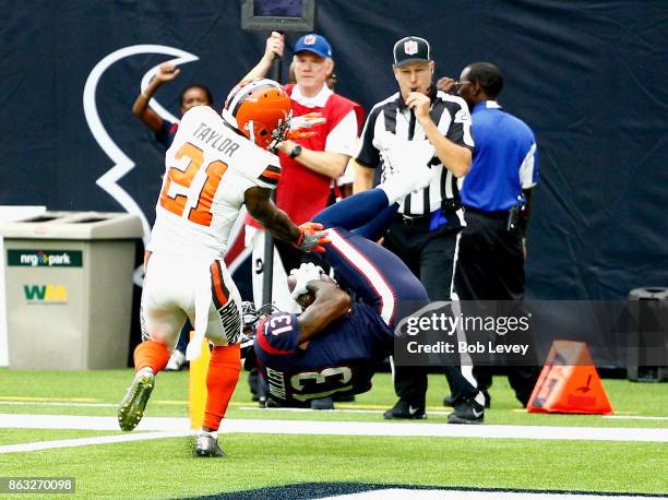 Braxton Miller of the Houston Texans flips into the end zone for a touchdown as Jamar Taylor of the Cleveland Browns is late on coverage at NRG...