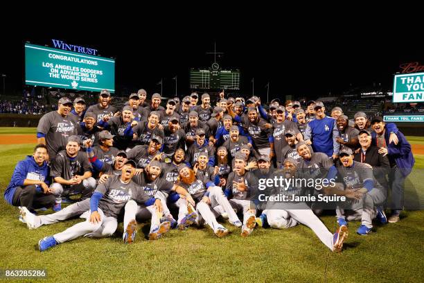 The Los Angeles Dodgers pose after defeating the Chicago Cubs 11-1 in game five of the National League Championship Series at Wrigley Field on...