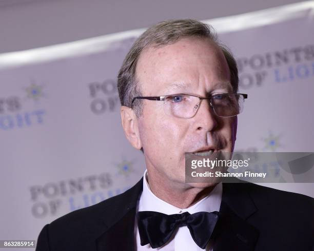 Neil Bush, chairman of the Points of Light board of directors and son of President George H.W. Bush, appears on the red carpet at the 2017 Points of...