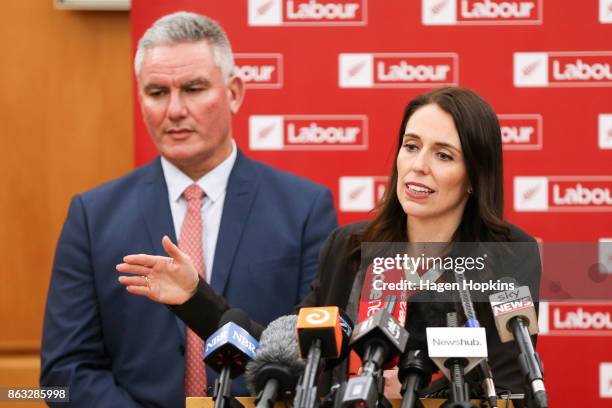 Labour leader and prime minister-elect, Jacinda Ardern, speaks to media while deputy Kelvin Davis looks on during a post-caucus meeting press...