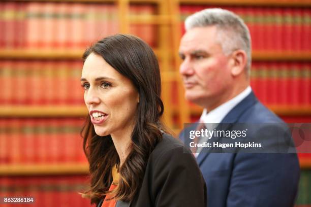 Labour leader and prime minister-elect, Jacinda Ardern, speaks to media while deputy Kelvin Davis looks on during a post-caucus meeting press...