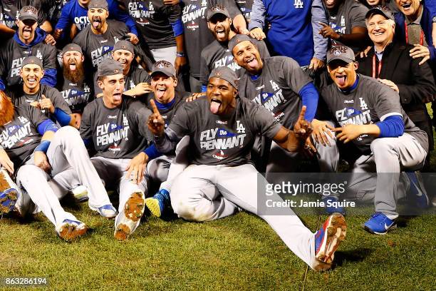 The Los Angeles Dodgers pose after defeating the Chicago Cubs 11-1 in game five of the National League Championship Series at Wrigley Field on...