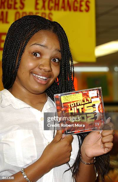 Actress Kyla Pratt poses at the Totally Hits 2002 lip-sync karaoke contest at Tower Records on June 27, 2002 in Los Angeles, California. The Totally...