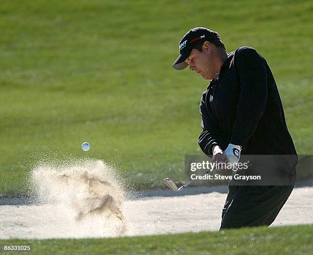 Jeff Quinney hits from a greenside bunker in the final round of the 2007 Bob Hope Chrysler Classic at the Classic Club in Palm Desert, California on...