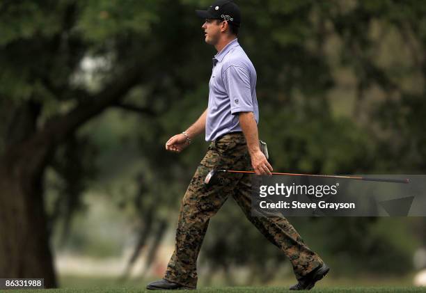 Rory Sabatini strolls past the 15th tee during the first round of the 2005 Shell Houston Open at the Redstone Golf Club in Houston, Texas April 21,...