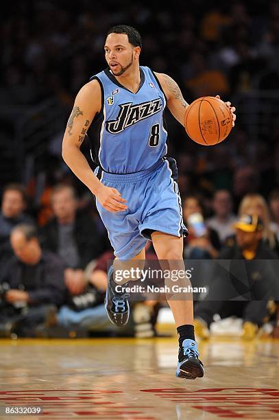 Deron Williams of the Utah Jazz drives the ball up court in Game Five of the Western Conference Quarterfinals against the Los Angeles Lakers during...