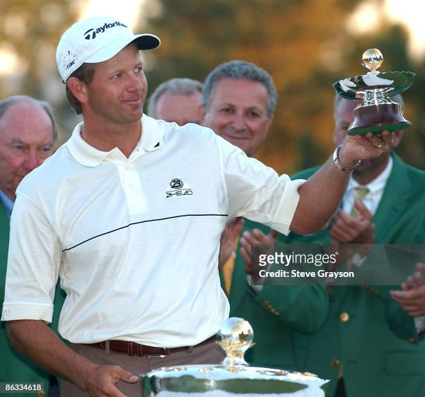 Retief Goosen holds the winner's trophy after posting a score of +32 to win The 2005 INTERNATIONAL at Castle Pines Golf Club in Castle Rock, Colorado...