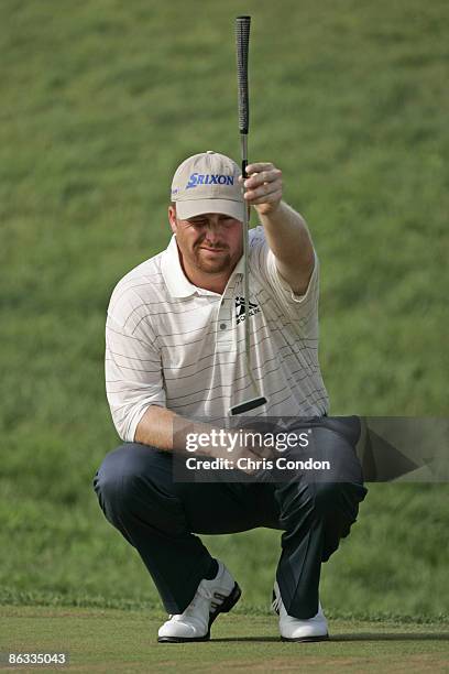 John Rollins lines up his putt on the fourth round the 2005 B.C. Open at En-Joi Golf Club in Endicott, New York. Sunday, July 17 2005.