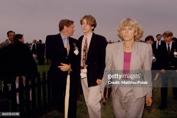 Andrew and Camilla Parker Bowles with their son Tom Parker Bowles attend the Queen's Cup polo match at Windsor, 7th June 1992.