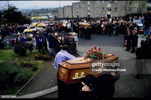 Funerals for catholic victims in Belfast - funeral cortege of Mark Rodgers and Jimmy Cameron, killed in agunfire.