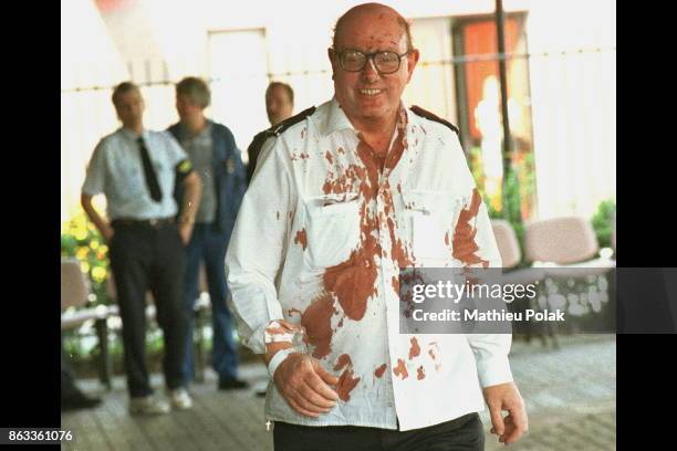 Attentat à la bombe attribué à l'IRA à Manchester : Un des 206 blessés suite à l'explosion d'une camionnette piégée qui a ravagé le quartier de...