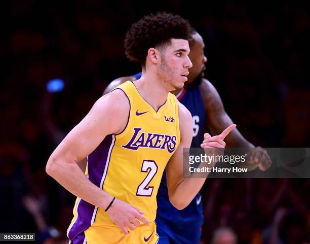 Lonzo Ball of the Los Angeles Lakers reacts after his first points as a Laker, a three pointer against the Los Angeles Lakers during the Los Angeles...