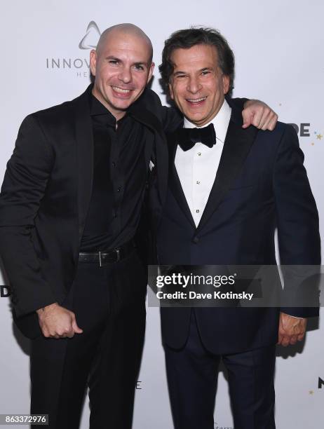 Singer Pitbull and CareOne Founder Daniel Straus attend Daniel E Straus & CareOne Starry Night Masquerade For Puerto Ricoat Skylight Clarkson North...