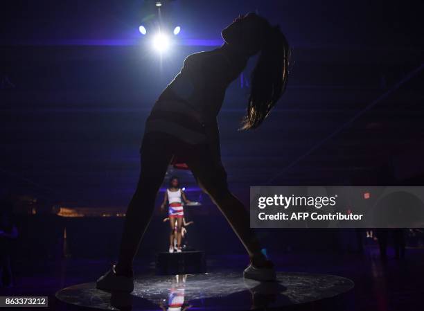 Dancers perform during the 2017 CareOne Masquerade Ball for Puerto Rico Relief Effort at Skylight Clarkson North on October 19, 2017 in New York...