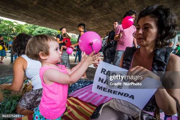 Group of parents and their children protest against a programe to allegedly improve the nourishing of students and fight hunger in Sao Paulo, Brazil,...