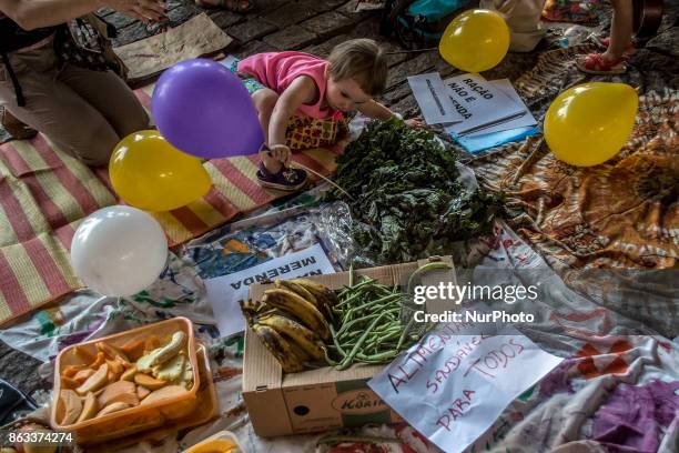 Group of parents and their children protest against a programe to allegedly improve the nourishing of students and fight hunger in Sao Paulo, Brazil,...