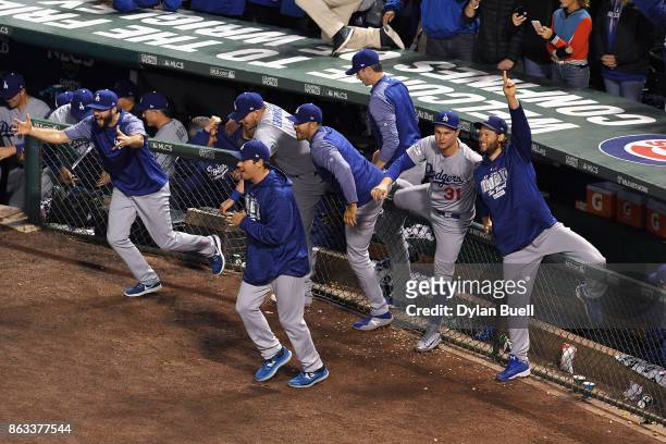 The Los Angeles Dodgers celebrate defeating the Chicago Cubs 11-1 in game five of the National League Championship Series at Wrigley Field on October...