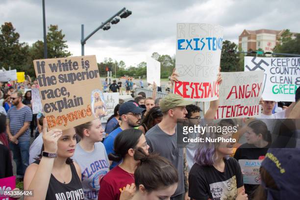 Protesters chant and carry signs against White Nationalism at the University of Florida in Gainesville, Florida, United States on October 19, 2017.