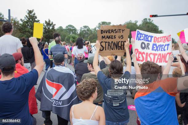 Protesters chant and carry signs against White Nationalism at the University of Florida in Gainesville, Florida, United States on October 19, 2017.