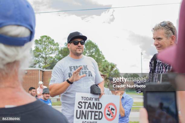 Man protests Nazis and Anti-Fascists at the University of Florida in Gainesville, Florida, United States on October 19, 2017.