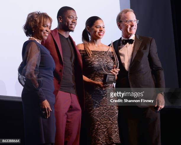 Pittsburgh Steelers cornerback Coty Sensabaugh and his wife, Dominique accept the 2017 Points of Light Tribute Award from Points of Light CEO Natalye...