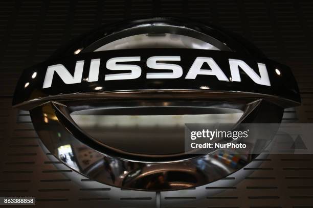 Logo of the Nissan Motor Co. Is displayed in Tokyo, Japan, October 19, 2017. Nissan dips 2% after suspending production in Japan.