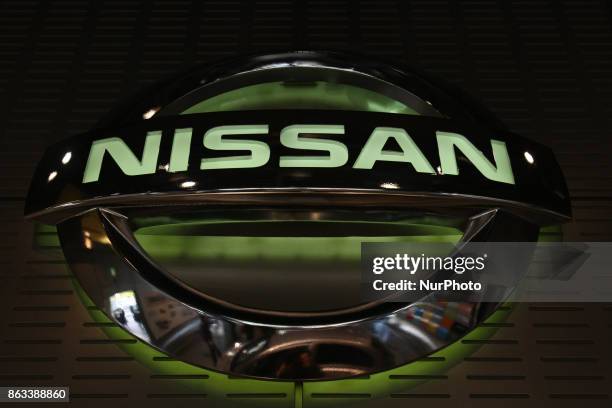 Logo of the Nissan Motor Co. Is displayed in Tokyo, Japan, October 19, 2017. Nissan dips 2% after suspending production in Japan.