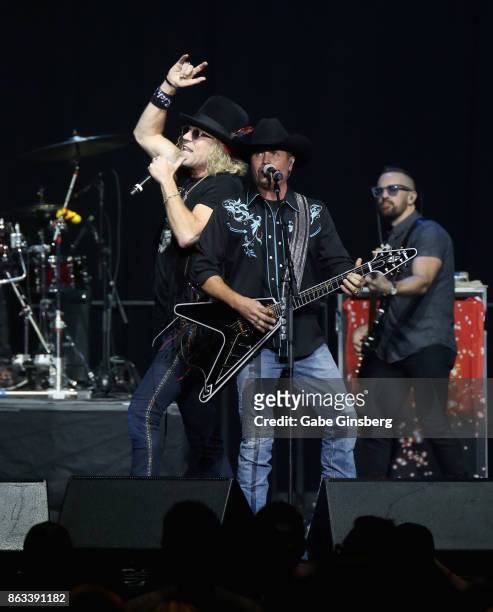 Recording artists Big Kenny Alphin and John Rich of Big & Rich perform during "Vegas Strong - A Night of Healing" at the Orleans Arena on October 19,...