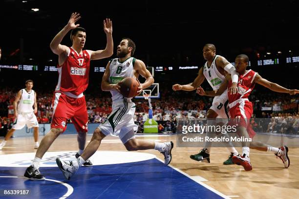 Vassilis Spanoulis, #6 of Panathinaikos competes with Zoran Erceg, #17 of Olympiacos during the Euroleague Basketball Final Four match between...