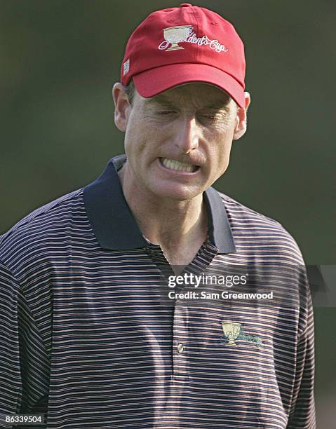 Jim Furyk of the U.S. Team shows his frustration during the first round of The Presidents Cup at Robert Trent Jones Golf Club in Prince William...