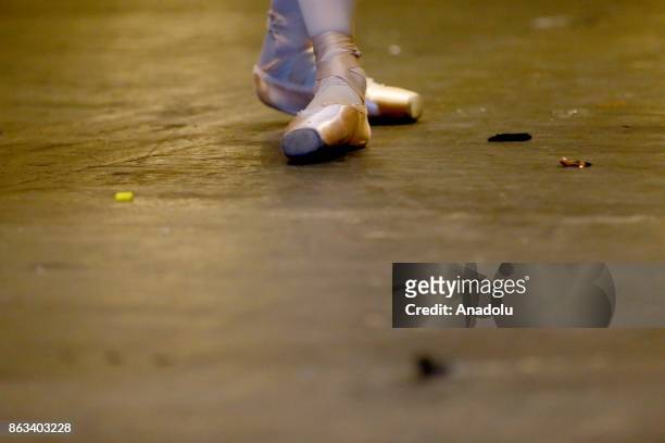 Ballerina Zhanna Gubanova's ballet shoes is seen during a dress rehearsal at the Russian Academic Youth Theatre in Moscow, Russia on October 20, 2017.