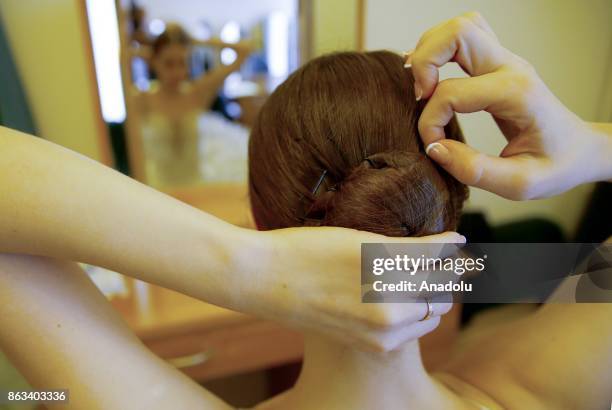 Ballerina Zhanna Gubanova is seen before dress rehearsal at the Russian Academic Youth Theatre in Moscow, Russia on October 20, 2017.