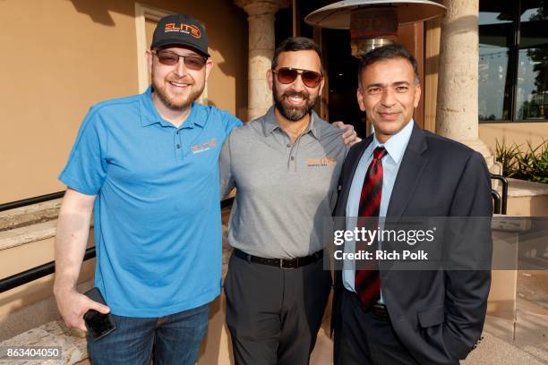 Elite Veteran Initiative Boardmember Robert Gunton, Zeeshawn Zia and a guest attend the Swing Fore The Vets Charity Golf Tournament on October 19,...